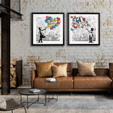 Living room with a brown sofa, coffee table, and two framed artworks on a brick wall.