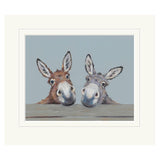 Two donkeys peeking over a surface with a light blue background