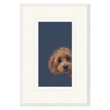 Framed artwork of a dog's face on a blue background