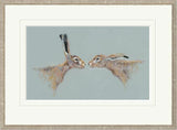 Framed artwork of two hares facing each other on a light blue background