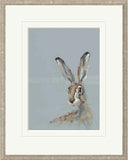 Framed artwork of a rabbit on a light blue background