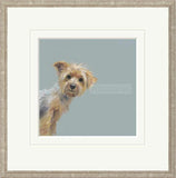 Framed artwork of a dog on a light blue background