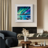 Framed artwork of a colorful landscape above a fireplace in a living room.