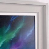 Framed artwork of the Northern Lights against a starry sky