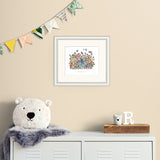 framed illustration on cream colour wall above metal cabinet