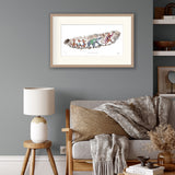 framed illustation of fox, badger and three foxes walking through an undeground tunnel on a wall above a sofa and side table