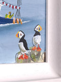 Corner of seascape artwork of two puffins 