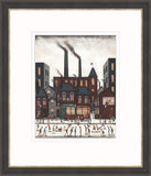 A framed art print depicting a whimsical city street scene with brick buildings, smoking chimneys, and small figures of people walking along the street, presented in a dark wood frame, Sean Durkin art