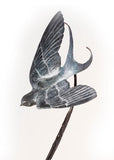 Bronze sculpture swallow on a white background