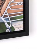 Framed artwork with a signature in the corner.