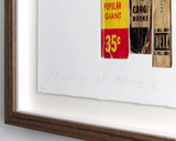 Corner of framed artwork of graphic book ends overlayed with text.