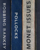 Three books with titles 'Robbing Banksy', 'Pollocks', and 'Monet Issues' on a dark background.