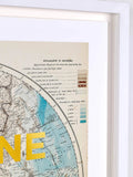 A framed vintage map print featuring a detailed coastal illustration with a color-coded depth legend and the partial yellow text 'ONE' visible at the bottom.