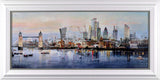 Framed artwork of a city skyline with prominent buildings, behind a body of water and bridge.