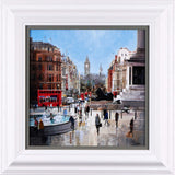 Framed artwork of a cityscape with a red bus, people, and architectural elements.