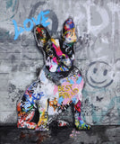 Colorful graffiti-style dog silhouette with 'Best Friend' text on a textured wall background.