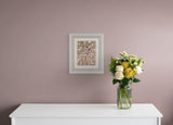 Small Floral Artwork on pink wall