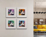 Framed artworks on a wall with a modern living room setting.