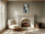 Abstract artwork hanging in modern boho living room