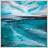 landscape of turquoise and teal sea under a cloudy sky