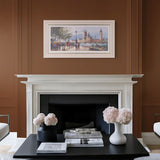 Framed artwork of London city on a deep brown wall above a traditional fireplace in a living room.