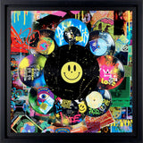 A vibrant artwork of colorful vinyl records and graffiti-style graphics arranged in a circular composition, with a large black record featuring a yellow smiley face at the center.