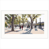 People walking in a park with trees and a cityscape in the background, Jo Quigley limited edition art print