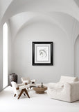 A framed black and white sketch of a horse on a white background with a black frame,