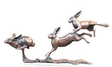 Richard Cooper solid bronze sculpture small hares playing