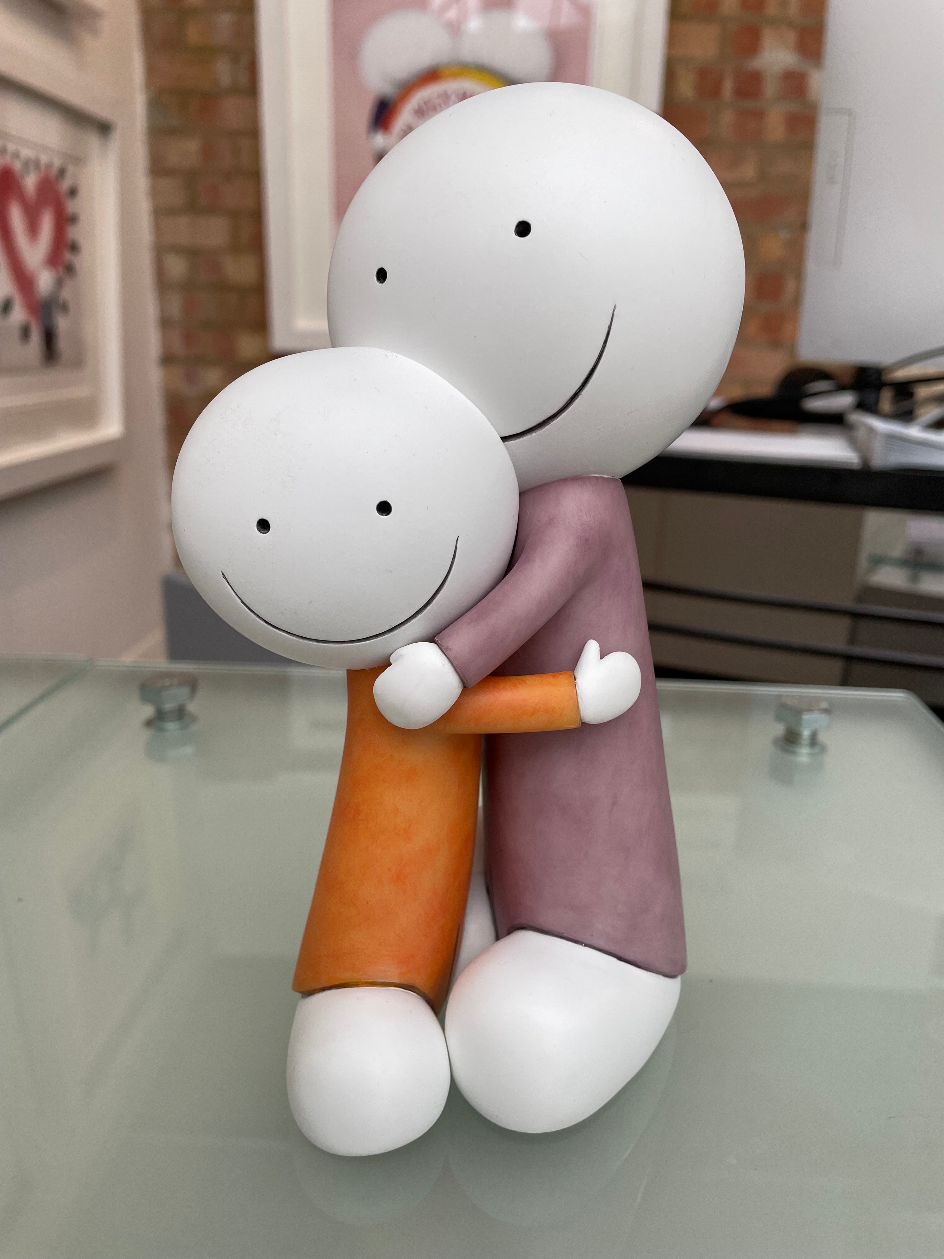 Doug Hyde cold cast porcelain sculpture Big Hugs in the gallery